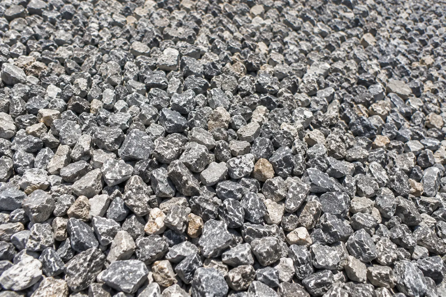 Pedregullo gris de construcción de cerca